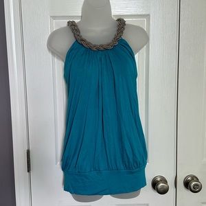 NWT! Romeo & Juliet Couture teal halter top with silver metallic accents! Size M